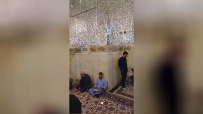 پوستر محل دفن رئیس جمهور شهید در کنار مرقد امام هشتم